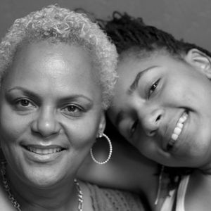 Wayman Tisdale's wife Regina and their daughter in 2008