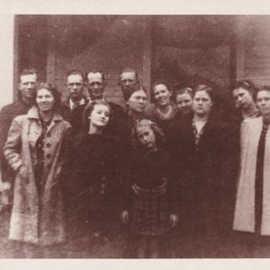 Clara Ann Fowler (front row, second from the left) stands with her family for a photo.