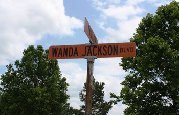 Wanda Jackson's hometown of Maud honored the singer by naming a road after her.