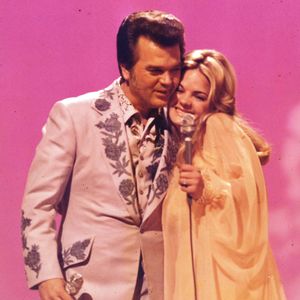 Conway Twitty and his daughter Joni performing their song, "Don't Cry Joni" on the 1975 CMA Awards Show.