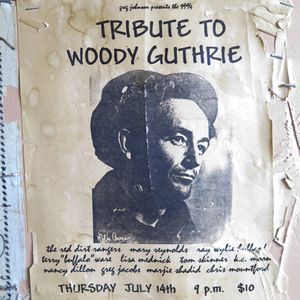 Woody Guthrie poster on the entryway wall of The Blue Door