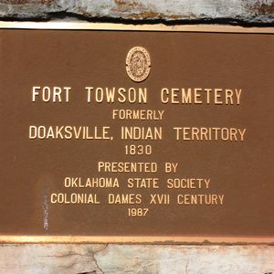 A sign marks the Oklahoma cemetery where the unmarked grave of Wallace Willis is possibly located. 