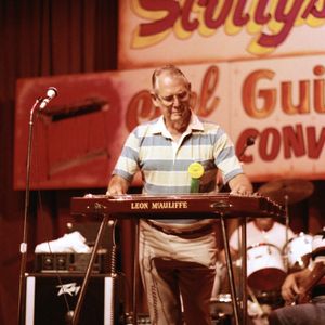 Leon McAuliffe performing on his steel guitar