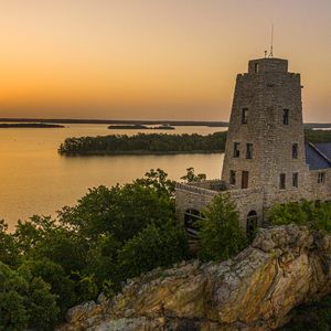 Watch from historic Tucker Tower as the sun sets over Lake Murray State Park. Photo by Shane Bevel.