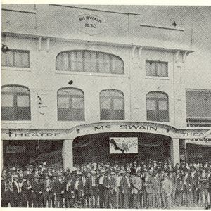 A group gathers outside the McSwain Theatre in the early 1920's to celebrate a performance