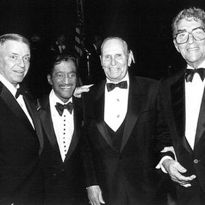 Oklahoma native Gene Autry poses for a photo with the Rat Pack - Frank Sinatra, Sammy Davis, Jr. and Dean Martin.