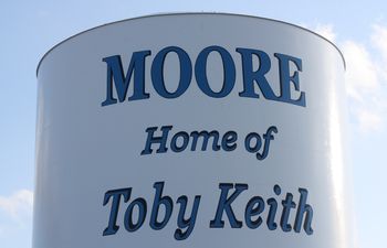 Visitors to Toby Keith's hometown, Moore, are welcomed with a water tower honoring the singer.