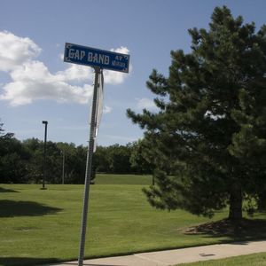 A sign for GAP Band Avenue appears on the Oklahoma State University Tulsa campus.