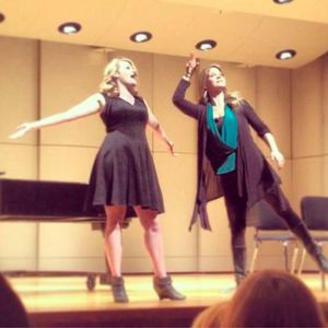 Kelli O'Hara, (right) works with students during a master class at Oklahoma City University in November 2013.