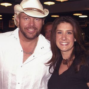 Kellie Coffey pictured with Toby Keith in 2003